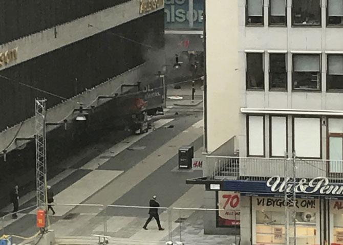 Van drives into crowd in Stockholm outside department store