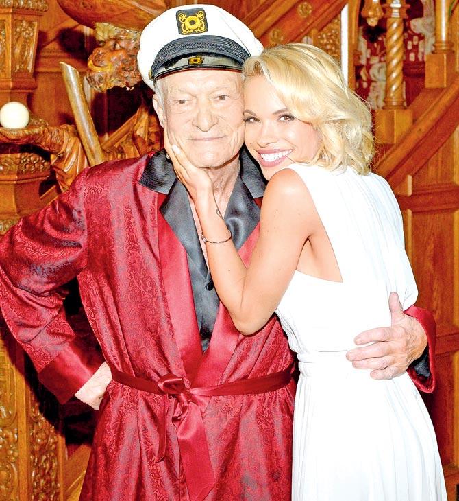 Hugh Hefner poses with Playboy model Dani Mathers. Pic/Getty Images