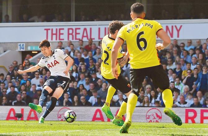 Tottenham’s Son Heung-Min (left) shoots to score against Watford in an EPL match at White Hart Lane on Saturday. Pic/AFP