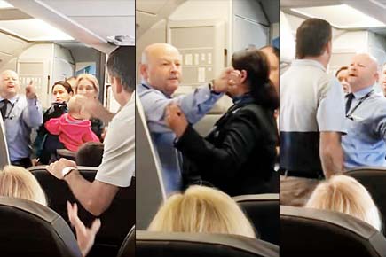 American Airlines staff removed after he hits woman with stroller