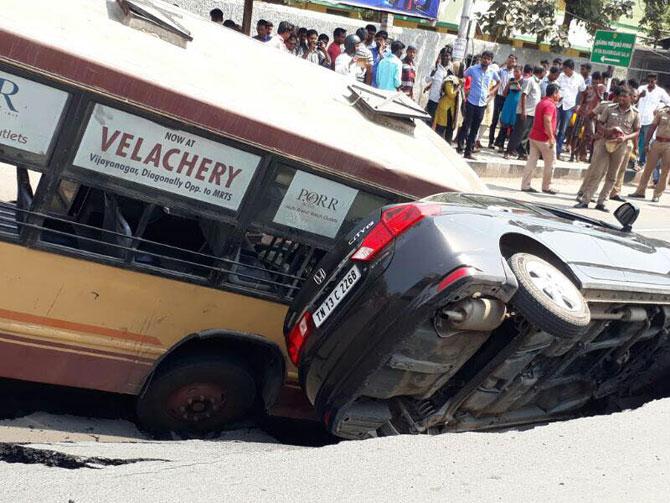 Chennai: Mount road in Anna Salai caves in taking down bus, car