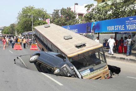 Chennai: Mount road in Anna Salai caves in taking down bus, car