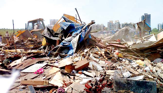 Civic body demolishes illegal structures in Kandivli