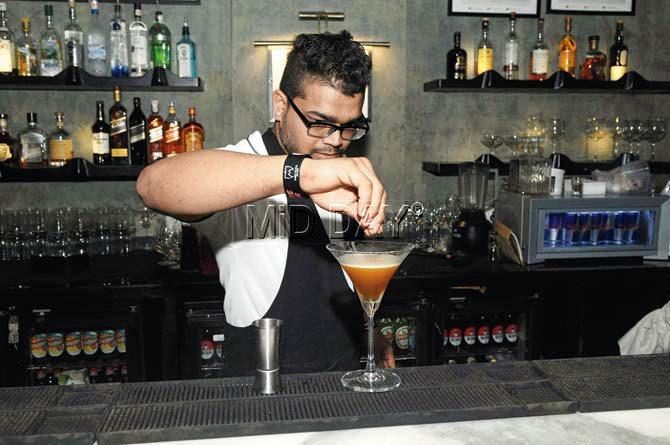 Bartender Joyal D’Souza makes Expresso Noir infused with vodka, vanilla and cold-pressed coffee