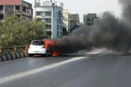 Car catches fire on Western Express Highway in Mumbai