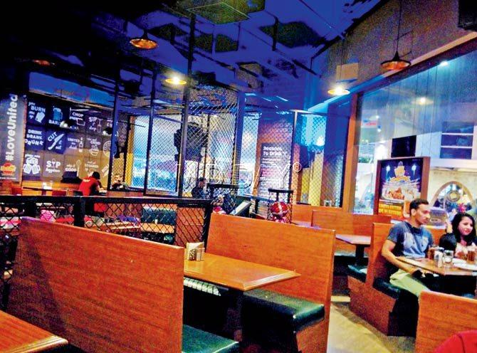 Barely one table is occupied at United Sports Bar, Viviana Mall, Thane