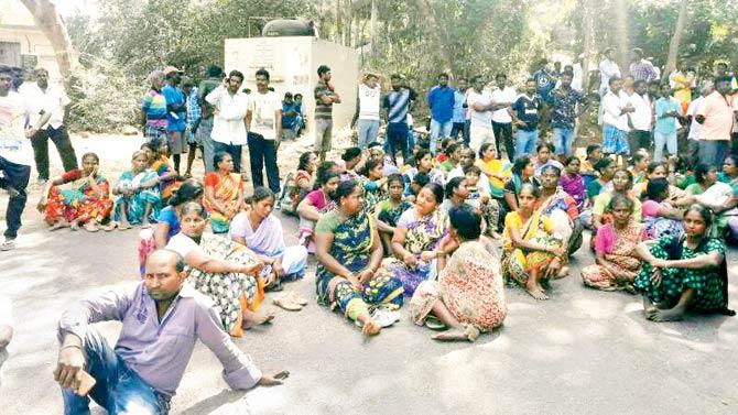 Residents protest outside Aarey police station this morning
