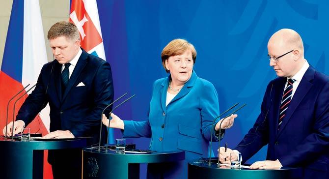Slovakia’s PM Robert Fico (left) with German Chancellor Angela Merkel and Czech PM Bohuslav Sobotka. Pic/AP