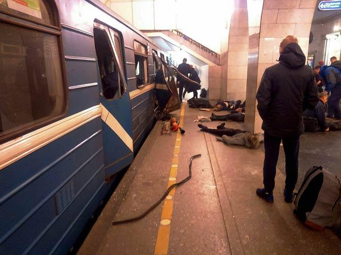 Blast victims lie near a subway train hit by a explosion at the Tekhnologichesky Institut subway station in St.Petersburg, Russia. Pics/AP/PTI