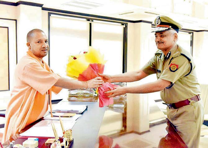 UPâu00c2u0080u00c2u0088CM Yogi Adityanath tweeted the pic with DGP Singh. Pic/Twitter