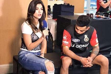 Was Virat Kohli ogling at IPL host Archana Vijaya's ripped jeans? Photo goes viral