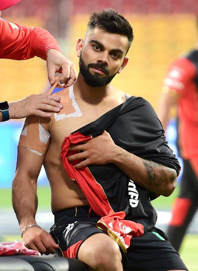 Virat Kohli gets bandage on his shoulder 