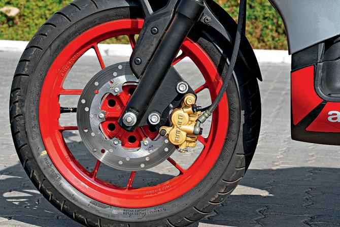 Racy red wheels add to the scooter