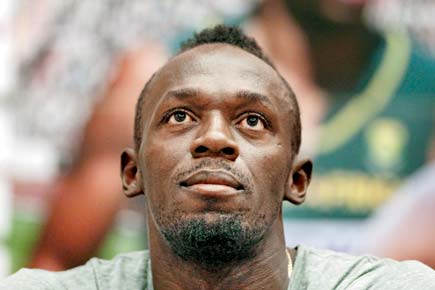 Usain Bolt's prefect record marred by teammate's doping