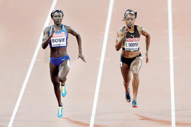 Tori Bowie (left) wins ahead of Elaine Thompson during the 100m  final at World Championships in London on Sunday. Pic/AFP