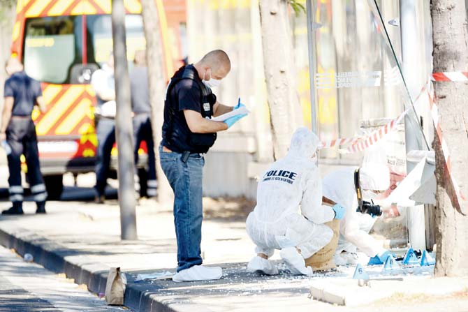 A bystander noted the registration number of the van, which the police used to trace the vehicle. Pic/AFP