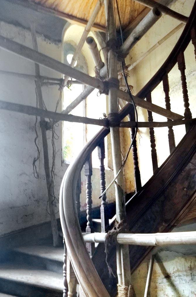 The crumbling heritage staircase on the south-west end of CSMT building has been propped up by bamboo stick