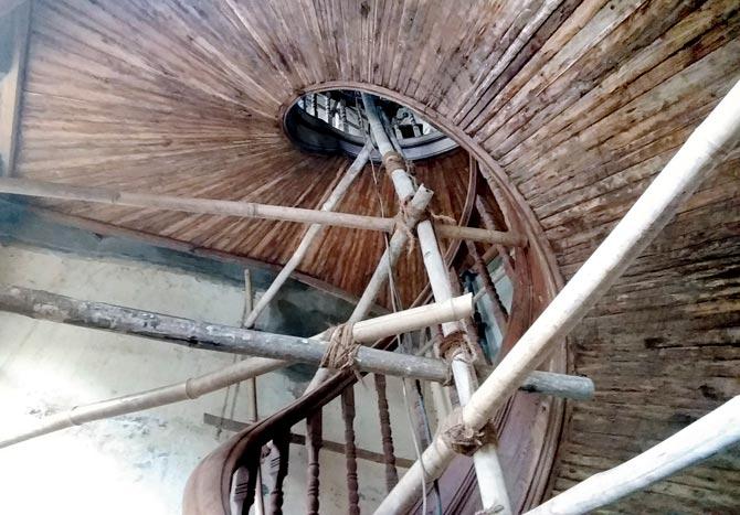 The crumbling heritage staircase on the south-west end of CSMT building has been propped up by bamboo stick