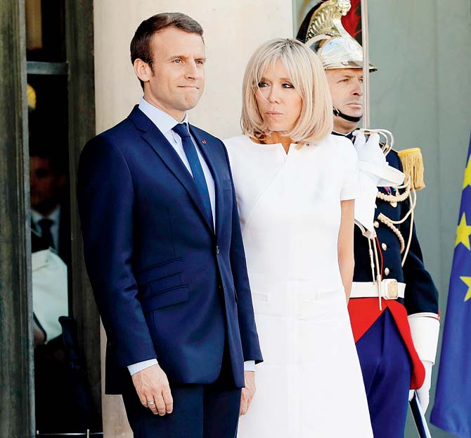 President Emmanuel Macron with Brigitte. Pic/AFP