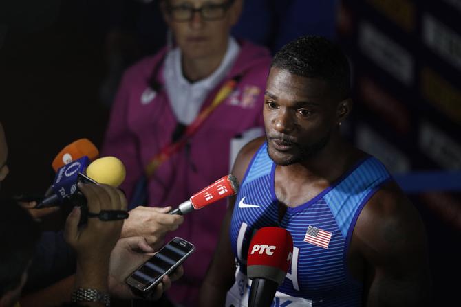 US athlete Justin Gatlin speaks to the press after the final of the men