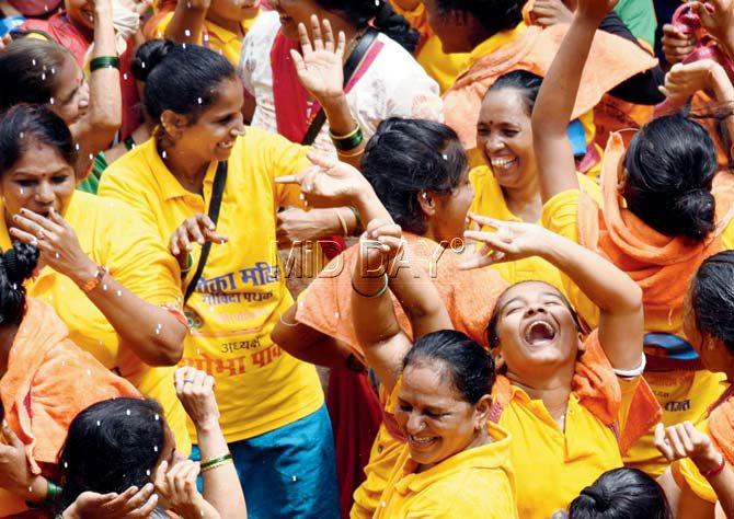 Revellers rejoice at a dahi handi celebration in Dadar West