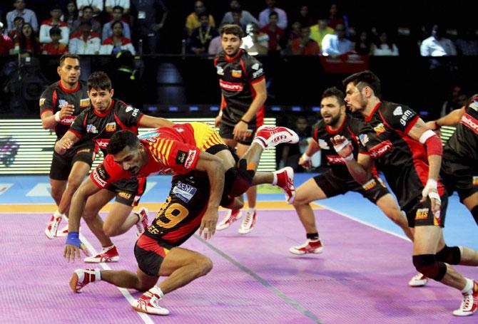 Bengaluru bulls and Gujarat fortune Giants players in action during the Pro Kabaddi league match in Ahmedabad on Tuesday. Pic/PTI