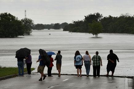 Houston flood: Major dam begins overflowing