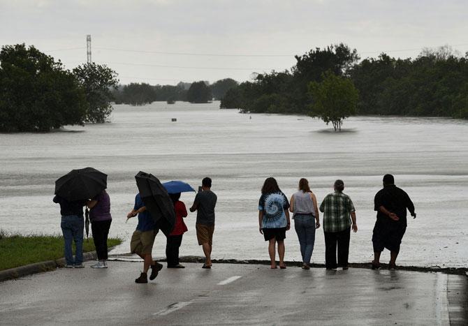 Houston flood: Major dam begins overflowing