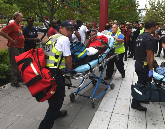 An evacuee is taken to hospital after feeling unwell at the Convention Center which is serving as an evacuation shelter after Hurricane Harvey caused heavy flooding in Houston. Pic/AFP