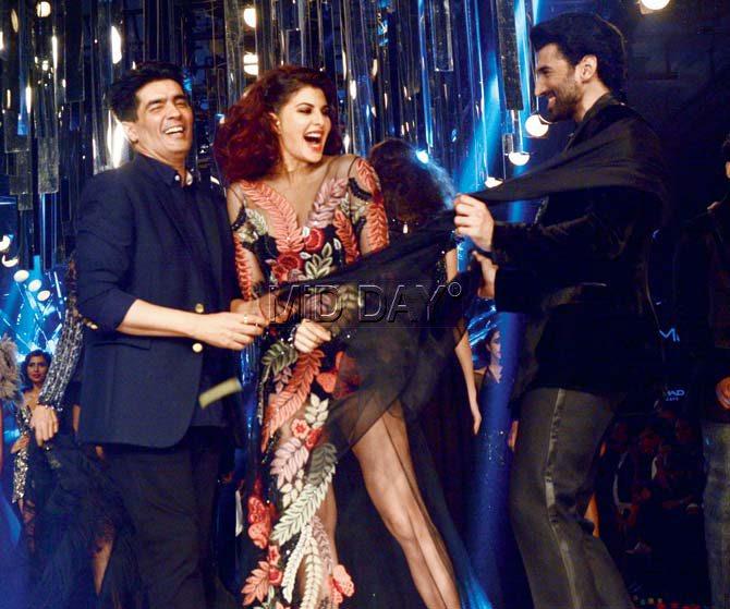 Jacqueline Fernandes with Manish Malhotra (left) and Aditya Roy Kapur. Pic/Satej Shinde