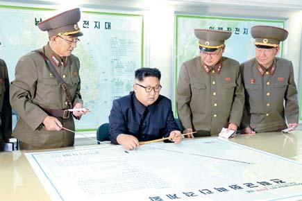 North Korean leader Kim Jong-Un holds off on Guam strike plan