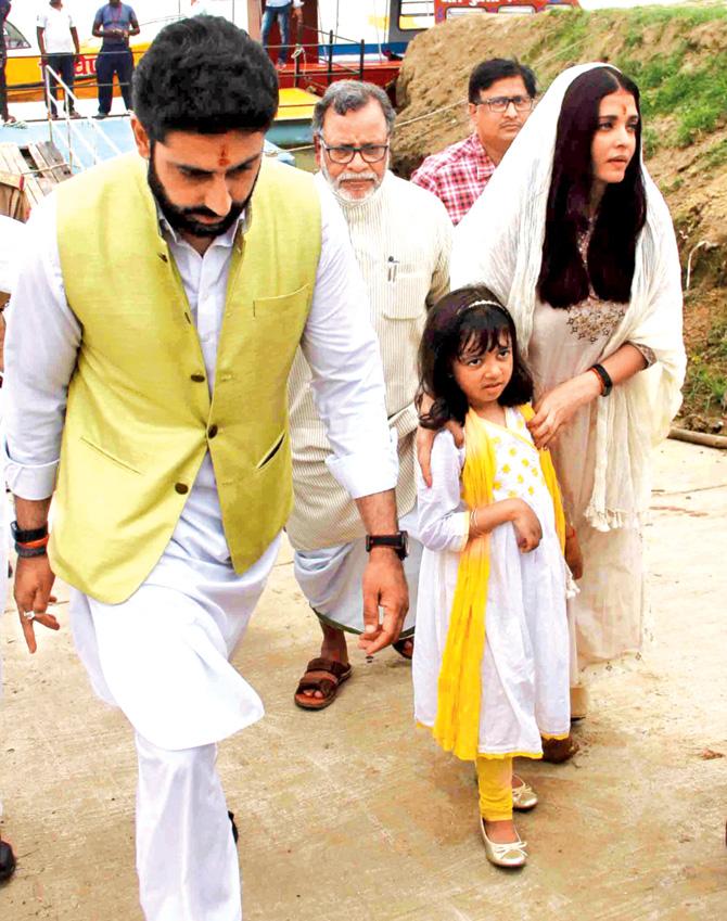 Aishwarya Rai with husband Abhishek Bachchan and daughter Aaradhya. Pic/PTI