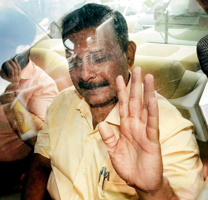 Lt Col Prasad Shrikant Purohit being taken from Taloja Central Jail to the Army base in Colaba on Wednesday. Pic/PTI