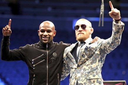 Conor McGregor floored by composed Floyd Mayweather