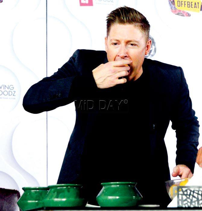 Former Australia cricketer Michael Clarke tries pani puri prepared by him during an event at Lower Parel yesterday. Pic/Suresh Karkera