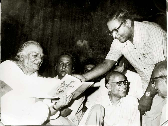 Faiz Ahmad Faiz is presented with a book on Urdu poetry in 1978. Pic/Wikimedia commons