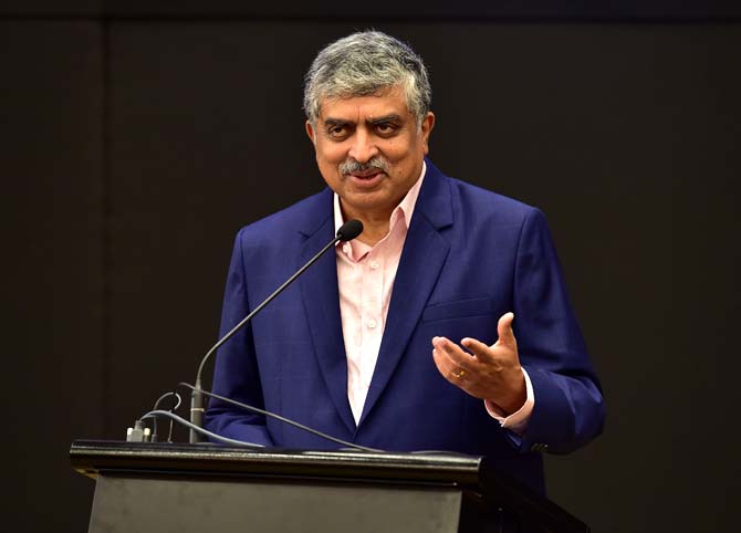 Newly appointed nonexecutive chairman of Infosys Nanadan Nilekani speaks at a press conference at the company