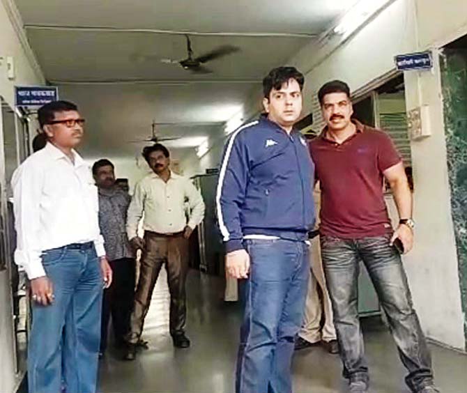 Accused Nitish Sharma (in blue) in custody for stalking Andheri resident Aditi Nagpaul