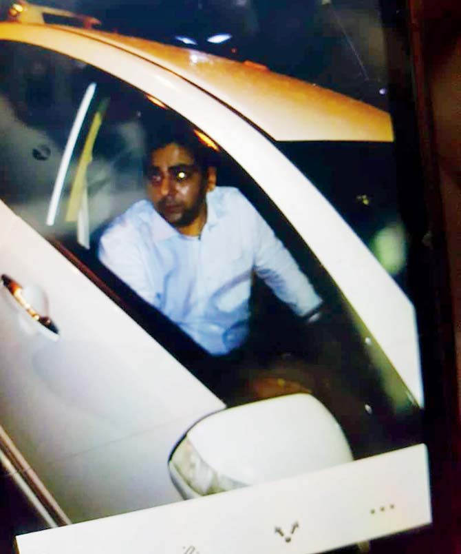 Accused Nitish Sharma seen outside Aditi Nagpaul’s building, waiting in his Honda Civic that had one alphabet in the number plate missing