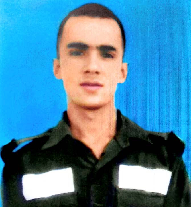 A photo of Sepoy Pawan Singh Sugra, 21, who lost his life in cross-firing by Pakistani troops at Line of Control (LoC) in Krishna Ghati (KG) Sector of Jammu and Kashmir. Pic/PTI