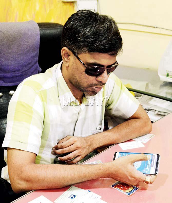 Paresh Satra, a navi Mumbai resident, tests a new feature on the Hear2Read app that enables users to access audio books in regional languages.âu00c2u0080u00c2u0088Pic/Sneha Kharabe
