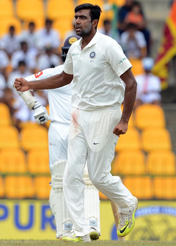 Indian cricketer Ravichandran Ashwin celebrates after he dismissed Sri Lankan cricketer Angelo Mathews during the third day of the third and final Test match between Sri Lanka and India at the Pallekele International Cricket Stadium in Pallekele on August 14, 2017. Pic/AFP