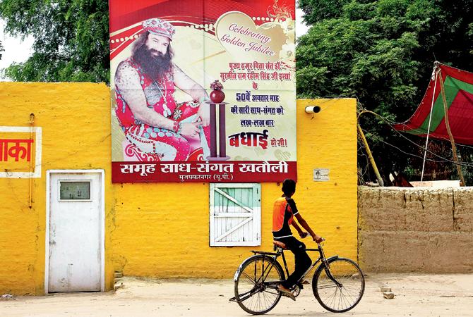 Since Gurmeet Ram Rahim Singh speaks to a large community, apparently, he has power and jurisdiction over his women devotees and that includes rape. Pic/AFP