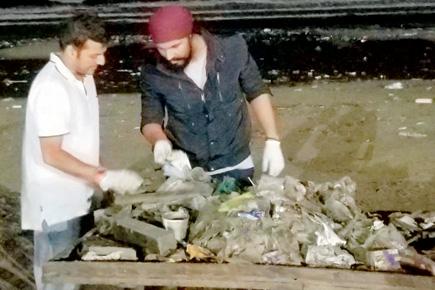 Randeep Hooda clears plastic at Versova beach in Mumbai
