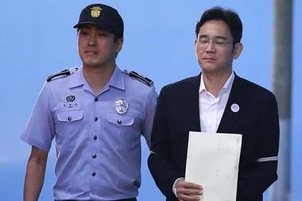 Samsung chief Lee Jae-yong sentenced to 5 years in prison