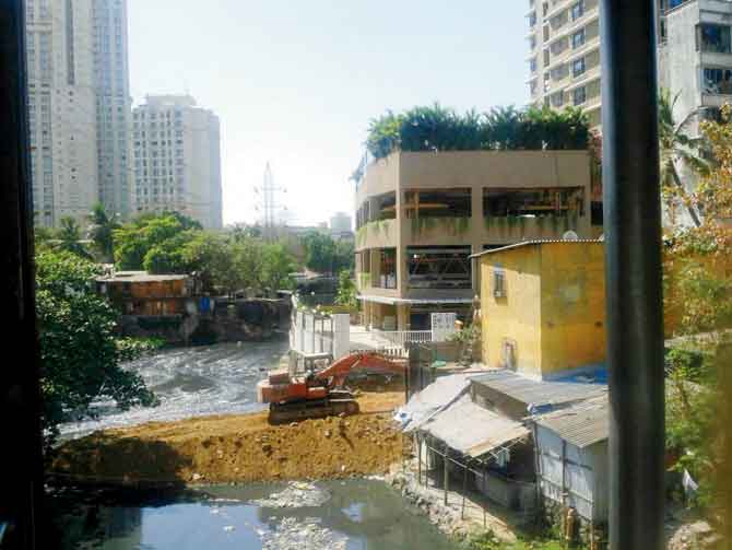 The members are also talking with the mandals along the Dahisar and Poisar (pictured) rivers so that the people staying in the slum pockets adjacent to them are educated about the negative impact of throwing plastic waste and garbage into the river. File pic