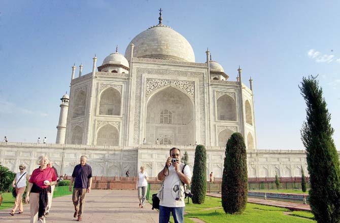The Taj Mahal on the banks of the Yamuna at Agra