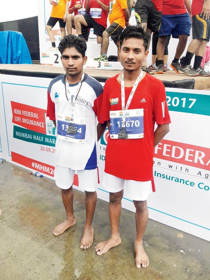 Tribal runners Somnath (left) and Narayan Pawara yesterday