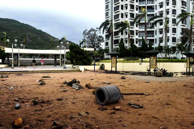 Debris lies in a damaged residential public space after heavy winds and rains brought on by Typhoon Hato in Hong Kong. Pic/AFP