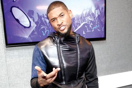 Usher denies post-gig hook up